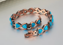 Load image into Gallery viewer, Folded close up of copper bracelet
