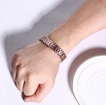 Load image into Gallery viewer, Vinci Scales Magnetic Copper Bracelet on a mans wrist
