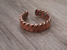 Load image into Gallery viewer, Copper ring on a wooden surface
