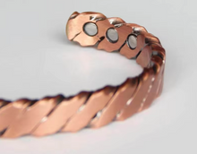 Load image into Gallery viewer, close up of the magnets on the copper bangle
