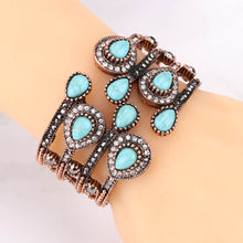 Load image into Gallery viewer, Turkish Inlaid Crystal Antique Copper Bangle on a woman&#39;s arm
