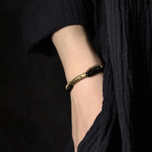 Load image into Gallery viewer, Handcrafted Copper Bracelet with Antique Finish on a females wrist
