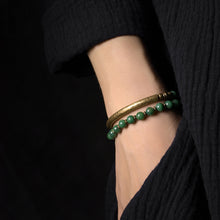 Load image into Gallery viewer, Green Multi-Layered Stone Handcrafted Copper Bracelet close up on somebody
