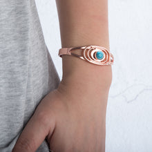 Load image into Gallery viewer, Demonstration of Vinci Blue Stone Open Cuff Magnetic Copper Bracelet on a person
